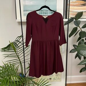 Classic maroon dress.